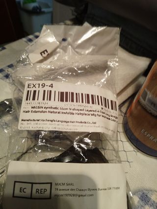 Extensiones de cabello ondulado castaño