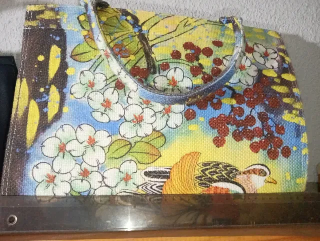 3 de 3; dos bolsos de mano