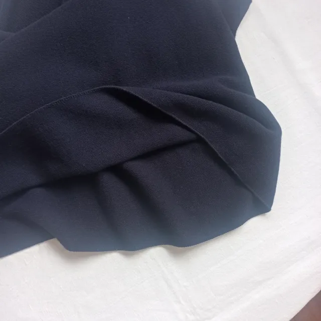 Falda midi punto azul marino