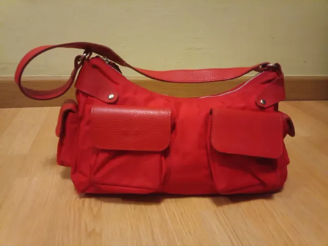 Bolso rojo Síntesis