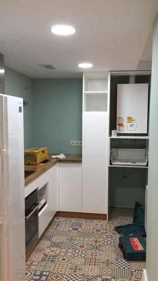 Cocina completa modular en “L”.