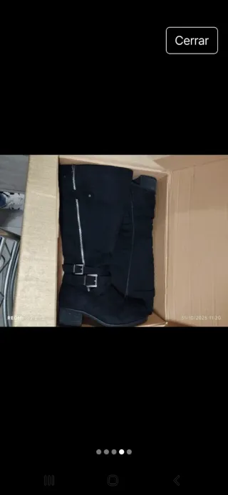 Botas altas negras con cremallera y hebillas