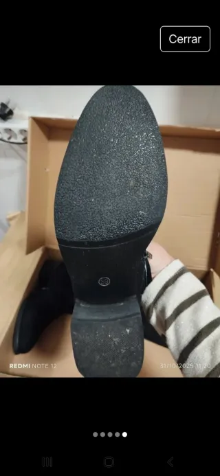 Botas altas negras con cremallera y hebillas