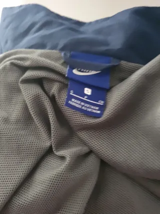 Chaqueta Nike azul y gris