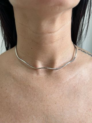 Collana rigida argento effetto onda