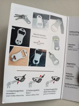 Apribottiglie e carrello spesa multifunzione