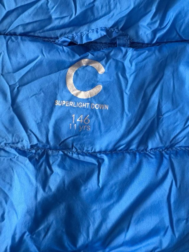 Chubasquero infantil azul plegable