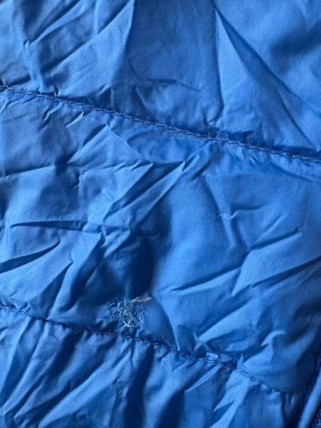 Chubasquero infantil azul plegable