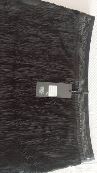 Minifalda negra flecos y lentejuelas