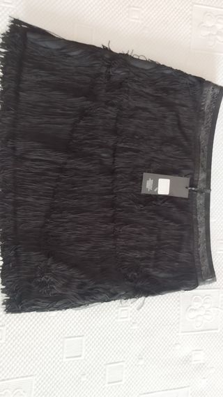 Minifalda negra flecos y lentejuelas