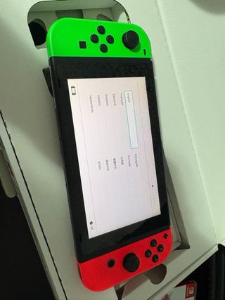 Nintendo Switch verde y Rojo +juegos +funda