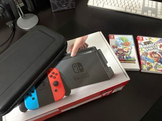 Nintendo Switch verde y Rojo +juegos +funda