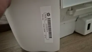 Impresora HP azul y blanca