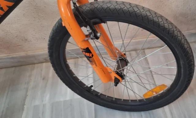 Bicicleta BMX Negra y Naranja