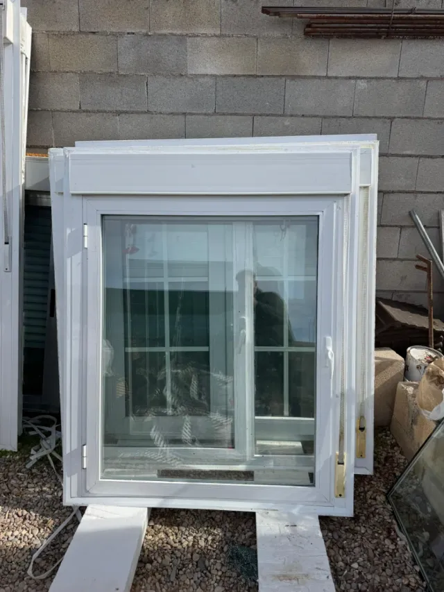 VENTANA ABATIBLE DE ALUMINIO DE CRISTAL CLIMALIT.