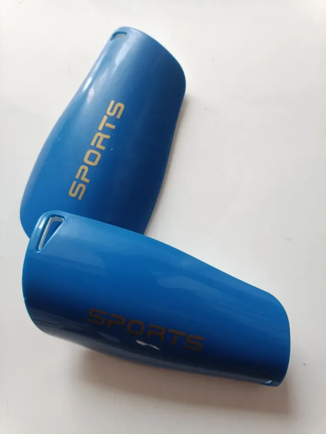 Espinilleras deportivas azules