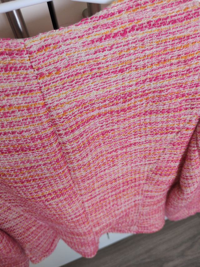 Chaqueta tweed rosa con cremallera