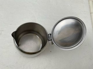 Lechera vintage de acero inoxidable con tapa