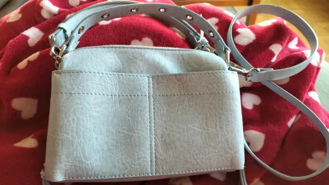 Bolso bandolera azul claro con cordones