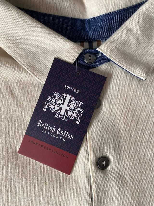 Polo de punto beige manga larga nuevo