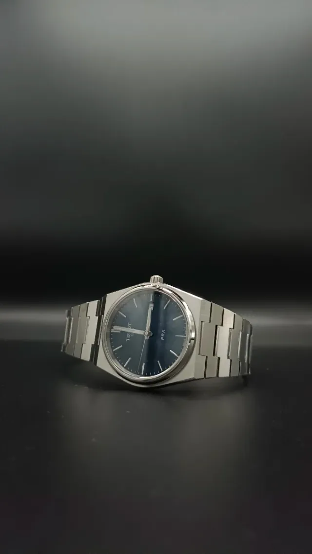 Reloj TISSOT PRX Plata y Azul oscuro,  nuevo