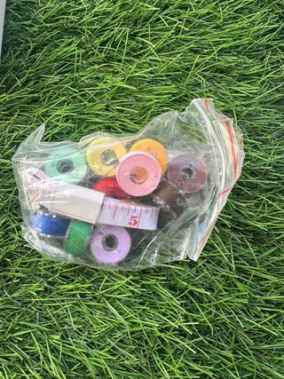 Máquina de coser de mano portátil