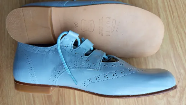 Zapatos inglesitos piel azul celeste T.33 