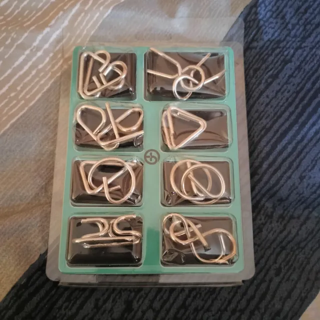 Pack 8 Puzzles Metálico