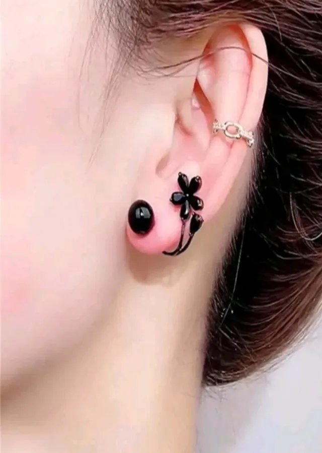 Pendientes flor negra mujer sin estrenar