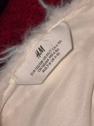 Chaquetita H&M pelo beige/blanca