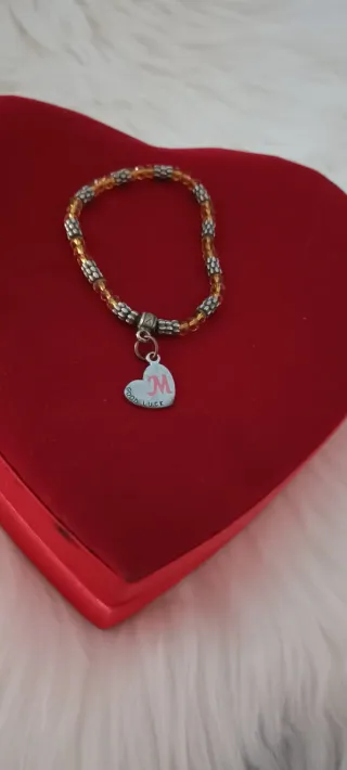 Pulsera ajustable con charm de corazón