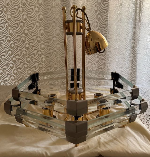 Lámpara de cristal y metal dorada