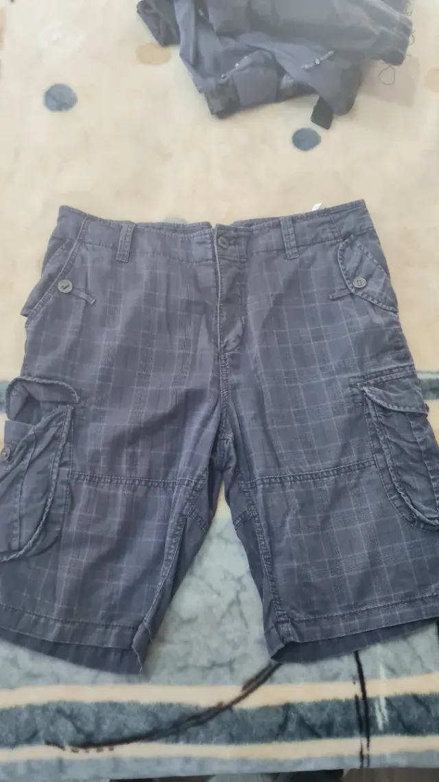 Pantalones cortos de cuadros grises y azules