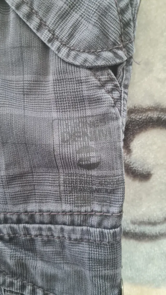 Pantalones cortos de cuadros grises y azules