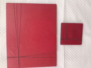 Sottopiatti e sottobicchieri in pelle