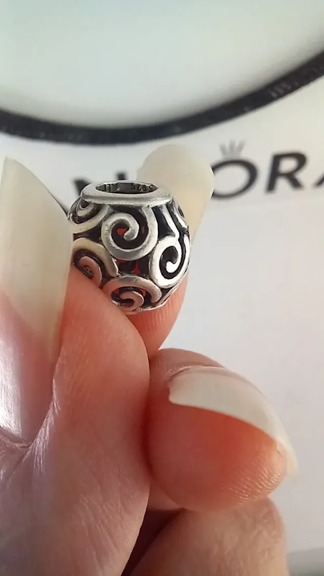 Pulsera Pandora con charms plata