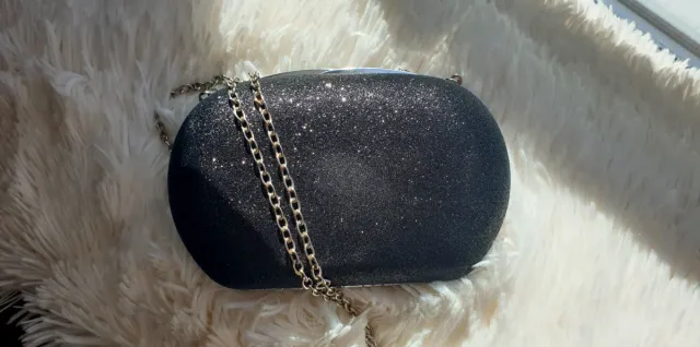 Bolso fiesta negro brillante tipo cofre