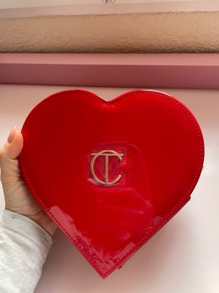 Bolso Charlotte Tilbury Rosa y Dorado