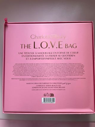 Bolso Charlotte Tilbury Rosa y Dorado