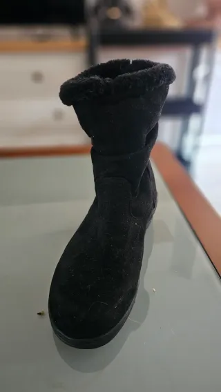 Botas negras con hebilla