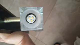 Lámpara de techo dorada y transparente