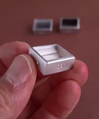 PRISMAS DE CORRECCIÓN DE PARALAJE