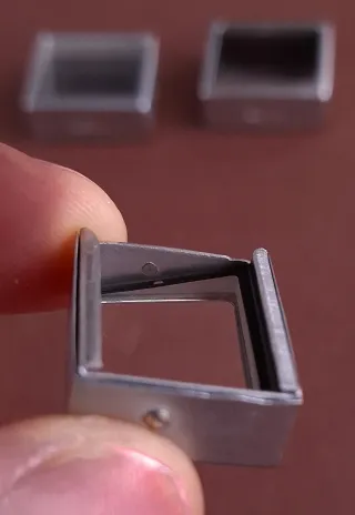 PRISMAS DE CORRECCIÓN DE PARALAJE