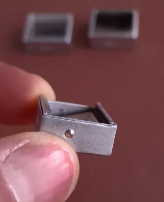 PRISMAS DE CORRECCIÓN DE PARALAJE