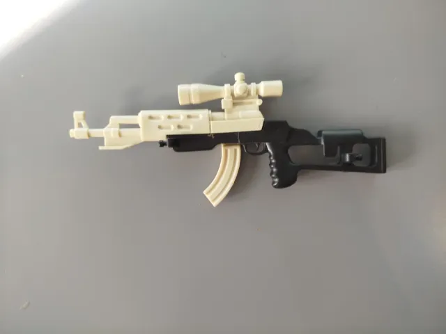 Pistola de juguete con mira