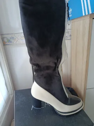 Botas altas piel y ante nuevas