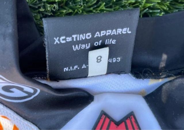 Ropa de moto XCTING naranja y blanca