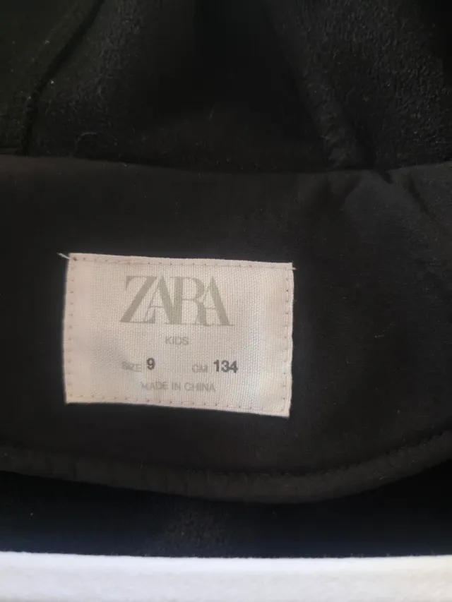 Chaqueta impermeable con capucha 134 cm -9 anos