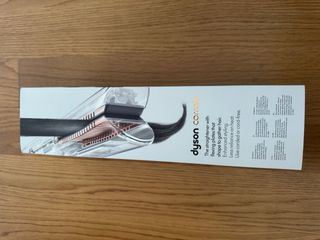 Plancha Dyson Corrale Negra y Dorada