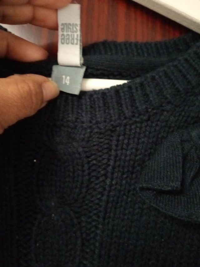 Chaleco azul marino con trenzas y lazo